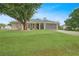 Charming single-story home with well-maintained lawn and mature tree in a desirable location at 22353 Blanchard Ave, Port Charlotte, FL 33952