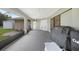 A covered lanai with lots of space and a grill at 22353 Blanchard Ave, Port Charlotte, FL 33952