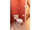 Bathroom featuring a toilet and tile floors at 238 Mark Twain Ln, Rotonda West, FL 33947