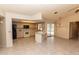 Open kitchen with a breakfast bar looking out to the pool at 238 Mark Twain Ln, Rotonda West, FL 33947