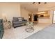 Spacious living room adjacent to kitchen featuring an open layout at 238 Mark Twain Ln, Rotonda West, FL 33947