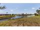 Beautiful waterfront property features a canal view for peaceful outdoor enjoyment at 238 Mark Twain Ln, Rotonda West, FL 33947