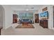 Cozy living room with a large window and comfortable seating arrangement at 24312 Westgate Blvd, Port Charlotte, FL 33980