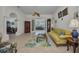 Spacious living room with an open floor plan leading to the dining area at 24312 Westgate Blvd, Port Charlotte, FL 33980