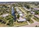 Aerial view of property highlighting a beautiful waterfront canal location in a residential community at 3129 Buttonwood Pl, Punta Gorda, FL 33950