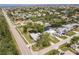 Aerial view of a single-Gathering home with boat dock, garage and easy access to nearby roadways at 3129 Buttonwood Pl, Punta Gorda, FL 33950