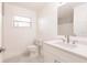 Bright bathroom with a single sink vanity, modern faucet, and white quartz countertop at 3129 Buttonwood Pl, Punta Gorda, FL 33950