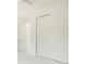 An empty bedroom featuring a closet with sliding doors and marble floors at 355 Milton St, Port Charlotte, FL 33954