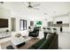 Open-concept living space featuring modern décor, white walls, and marble accents, ideal for relaxation and entertaining at 355 Milton St, Port Charlotte, FL 33954