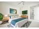 Comfortable main bedroom with stylish decor, a ceiling fan, and elegant furnishings at 355 Milton St, Port Charlotte, FL 33954