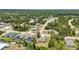 Breathtaking aerial view of a neighborhood with beautiful homes and lush landscaping provides a glimpse of peaceful suburban living at 3799 Laredo Ave, North Port, FL 34288
