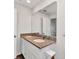 Bathroom features a double vanity, granite countertop, and modern fixtures at 3799 Laredo Ave, North Port, FL 34288