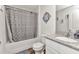 Well-lit bathroom with a shower-tub combination, granite countertop, and modern fixtures at 3799 Laredo Ave, North Port, FL 34288
