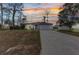Charming single-story home with a well-manicured lawn, complemented by a spacious driveway and an attached two-car garage at 3799 Laredo Ave, North Port, FL 34288