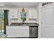Charming kitchen showcasing granite countertops, stainless steel dishwasher, and bright cabinetry at 3799 Laredo Ave, North Port, FL 34288