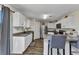 Bright kitchen features granite countertops, stainless steel appliances, and an eat-in breakfast bar at 3799 Laredo Ave, North Port, FL 34288