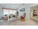 Bright living room with neutral tones, carpet flooring, and lots of natural light at 4055 Alwick Ln, North Port, FL 34287