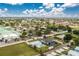 Scenic aerial shot of the community, showcasing the home's proximity to local parks and residential streets at 416 Allen St, Punta Gorda, FL 33950