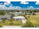 Aerial view of a residential neighborhood showcasing well-maintained homes and landscaping at 416 Allen St, Punta Gorda, FL 33950