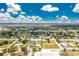 Expansive aerial view of a coastal town featuring residential areas and waterways at 416 Allen St, Punta Gorda, FL 33950