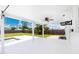 Spacious covered patio overlooking the backyard pool and lush green lawn at 416 Allen St, Punta Gorda, FL 33950