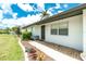 Close up of the home's front door and fresh landscaping at 416 Allen St, Punta Gorda, FL 33950
