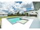 Inviting pool with integrated spa and covered patio, perfect for outdoor entertaining at 416 Allen St, Punta Gorda, FL 33950