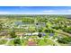 Expansive aerial view of the community, showcasing the lakes, lush greenery, and desirable neighborhood setting at 425 Corrientes Cir, Punta Gorda, FL 33983