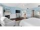 Bright and airy main bedroom with fireplace and stylish furnishings at 425 Corrientes Cir, Punta Gorda, FL 33983