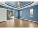 Bedroom with tile flooring and access to a patio with an outdoor kitchen at 43406 Boardwalk Loop, Punta Gorda, FL 33982