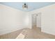 Bright office with wood-look tile floor, a modern ceiling fan, and decorative wall trim at 43406 Boardwalk Loop, Punta Gorda, FL 33982