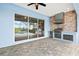 The outdoor kitchen features a built-in grill, countertop space, and stylish brickwork at 43406 Boardwalk Loop, Punta Gorda, FL 33982