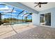 Relaxing pool, hot tub, and stunning lake views offer the perfect outdoor oasis at 43406 Boardwalk Loop, Punta Gorda, FL 33982