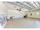 Spacious garage with ample room for parking and storage at 4380 Maddock Cir, North Port, FL 34286