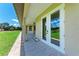 Outdoor patio with view of the yard and surrounding landscape at 4380 Maddock Cir, North Port, FL 34286