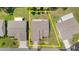 Aerial view of the home displaying the property lines, roof, landscaping, and driveway at 541 Wekiva River Ct # 94, Englewood, FL 34223