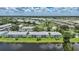 Aerial view of the condo buildings and landscaping in the community at 5725 Greenwood Ave # 2101, North Port, FL 34287