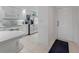 Bright kitchen with white cabinets, stainless steel appliances and tile floors at 5725 Greenwood Ave # 2101, North Port, FL 34287