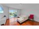 Living room with sliding glass doors to a patio overlooking the water at 5725 Greenwood Ave # 2101, North Port, FL 34287