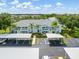 Beautiful condo complex with covered parking, lush landscaping, and private balconies, perfect for relaxing outdoors at 5725 Greenwood Ave # 8203, North Port, FL 34287