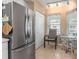 Well-equipped kitchen with stainless steel appliances and a cozy breakfast nook for casual dining at 5725 Greenwood Ave # 8203, North Port, FL 34287