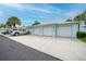 Attached garage offers convenient parking, and protection from the elements at 5762 Sabal Trace Dr # 203, North Port, FL 34287