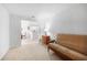 Living room with views to kitchen with pass through at 5762 Sabal Trace Dr # 203, North Port, FL 34287