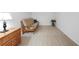 Spare room with neutral carpet and futon at 5762 Sabal Trace Dr # 203, North Port, FL 34287