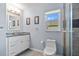 Modern bathroom with updated vanity and glass-enclosed shower at 7183 Spinnaker Blvd, Englewood, FL 34224
