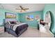 Inviting bedroom with a ceiling fan and ample natural light at 7183 Spinnaker Blvd, Englewood, FL 34224