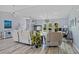 Cozy living space with comfortable seating and views of the home's entryway at 7183 Spinnaker Blvd, Englewood, FL 34224