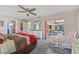 Bright bedroom with sliding glass door leading to patio at 7183 Spinnaker Blvd, Englewood, FL 34224