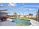 Sparkling pool with a screened enclosure, offering a perfect outdoor retreat at 7183 Spinnaker Blvd, Englewood, FL 34224