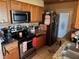 Well-equipped kitchen with stainless steel appliances and granite countertops at 8158 Trionfo Ave, North Port, FL 34287